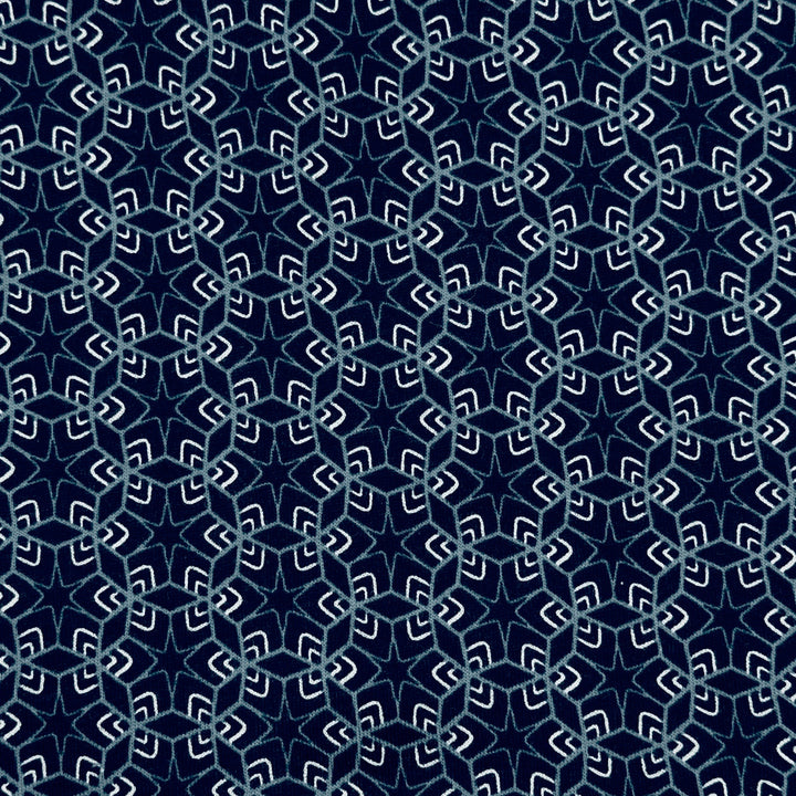 Geometric pattern with white shapes on a blue background