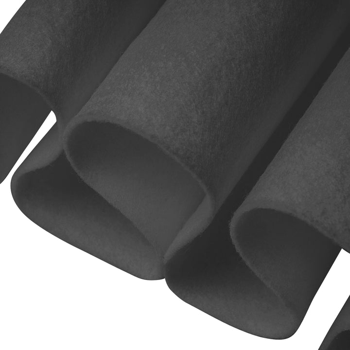 Close-up of black felt sheets on a white background