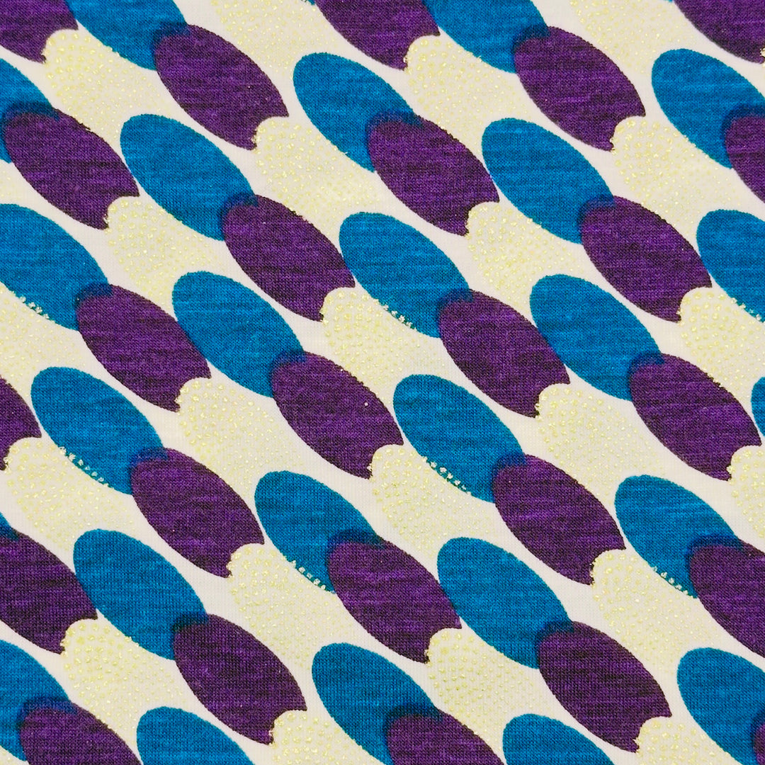 Teal and purple oval dot print cotton jersey knit fabric, 58–60 inch wide, 165 GSM.