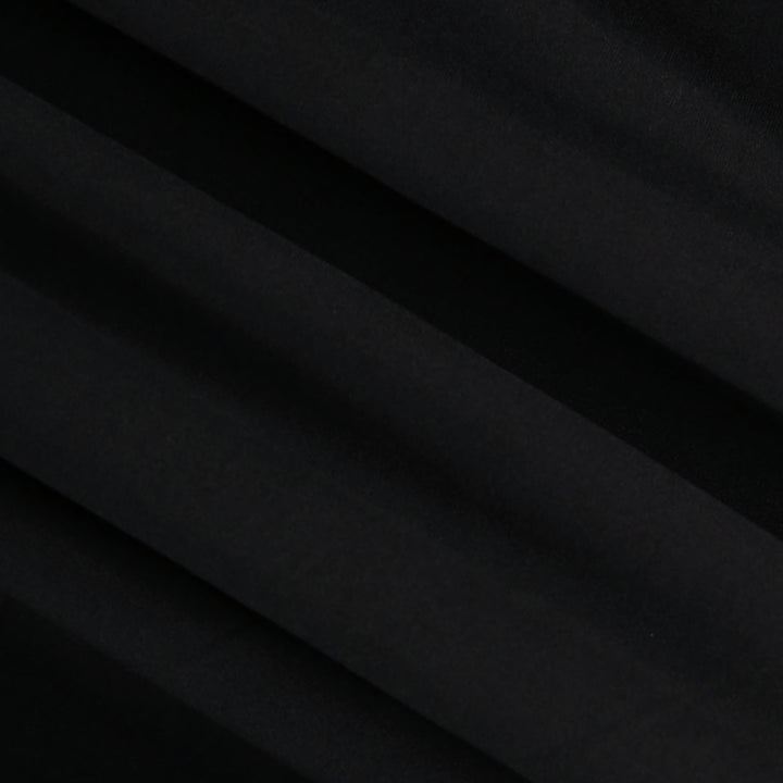 Close-up texture of double brushed poly spandex knit – Black