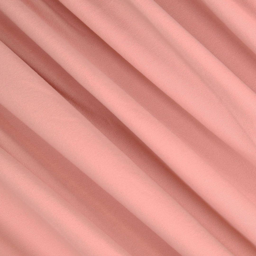 Close-up texture of double brushed poly spandex knit – Dusty Rose