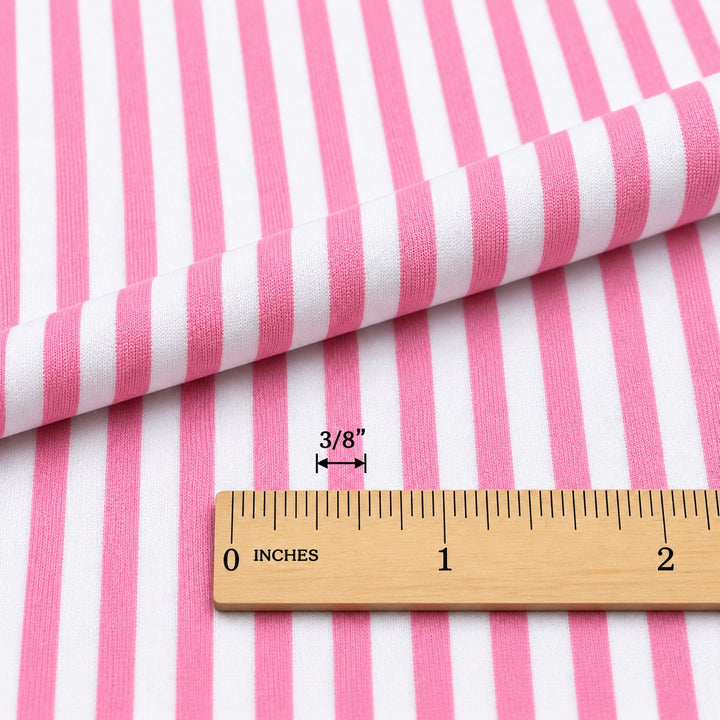 Cotton spandex stripe fabric with ruler showing 3/8 inch stripe width