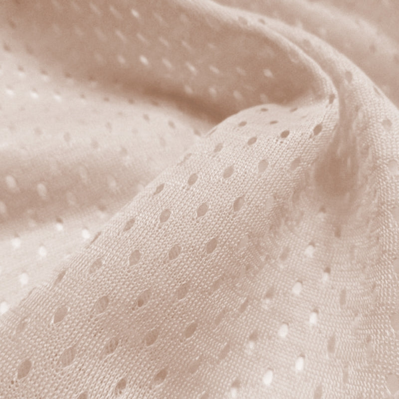 Football Mesh fabric in Cream, 100% polyester, sold by the yard