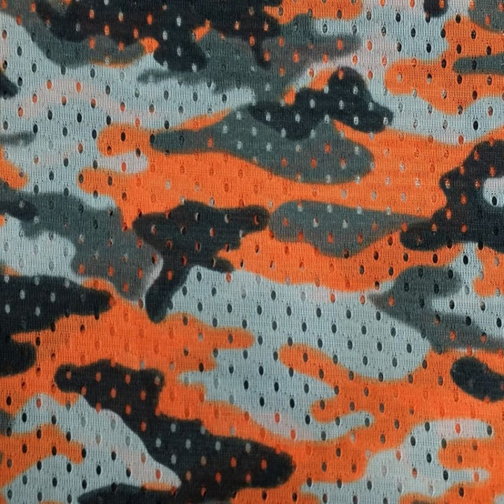 Camouflage Football Mesh fabric in Orange, sold by the yard
