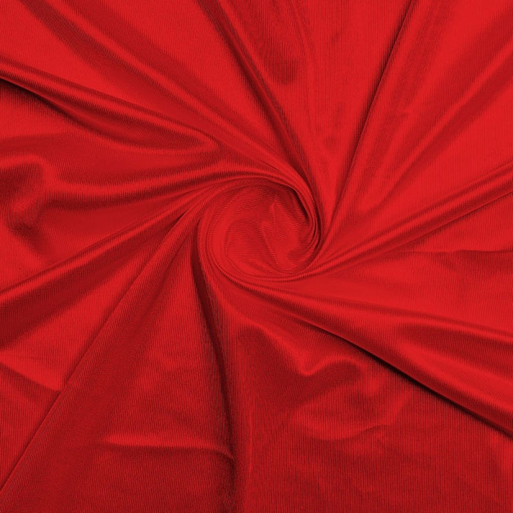 Athletic Dazzle Polyester fabric in Red, sold by the yard