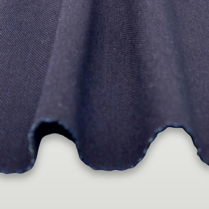 Dark navy 4-way stretch denim fabric draped