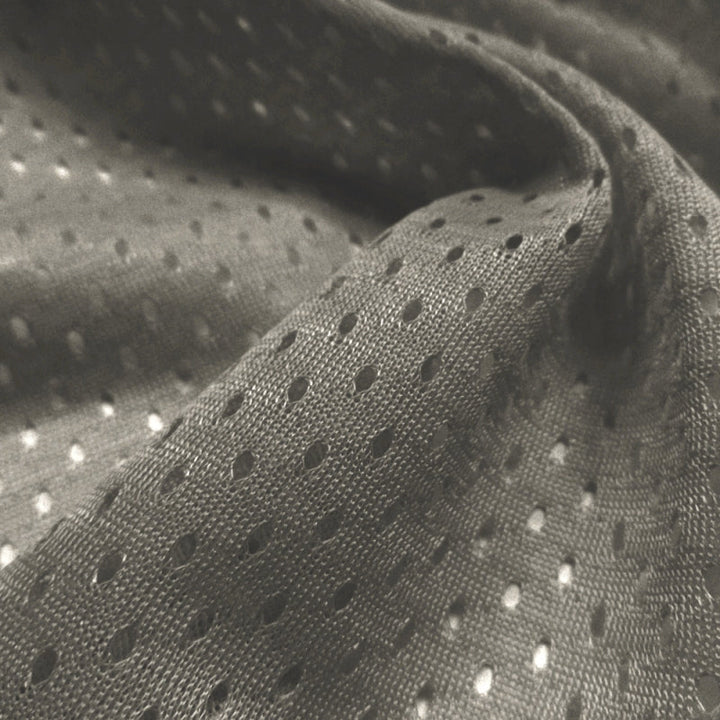 Football Mesh fabric in Charcoal, 100% polyester, sold by the yard