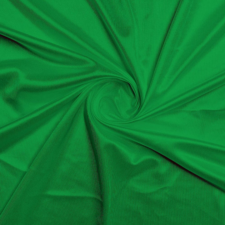 Athletic Dazzle Polyester fabric in Kelly Green, sold by the yard