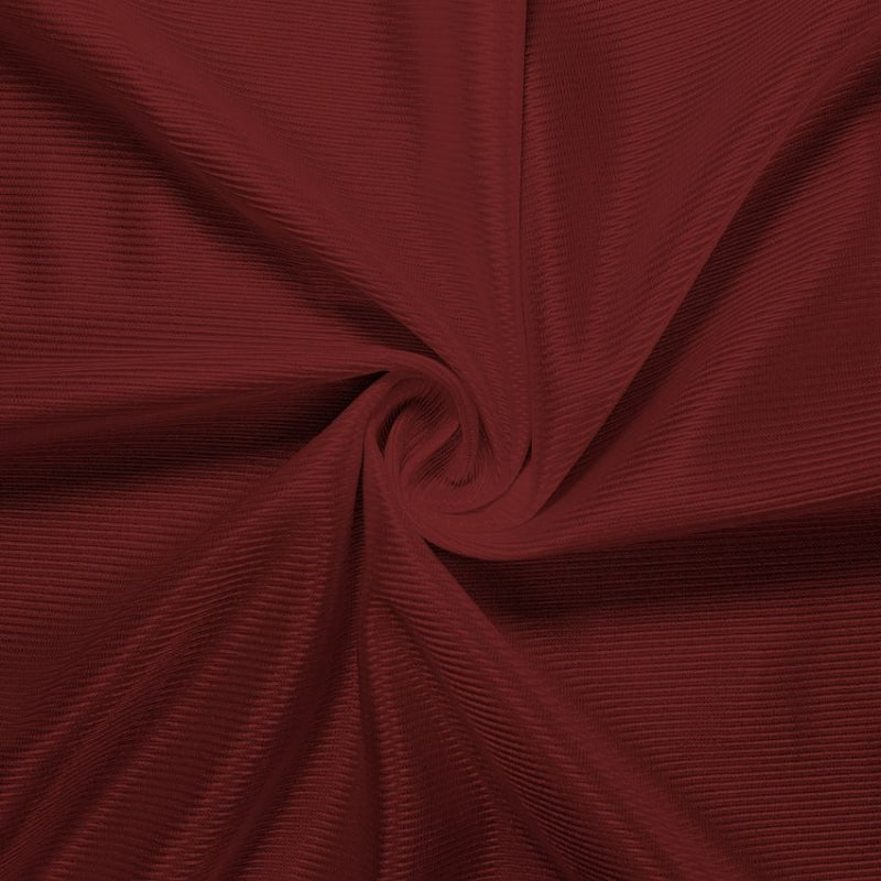 Athletic Dazzle Polyester fabric in Burgundy, sold by the yard
