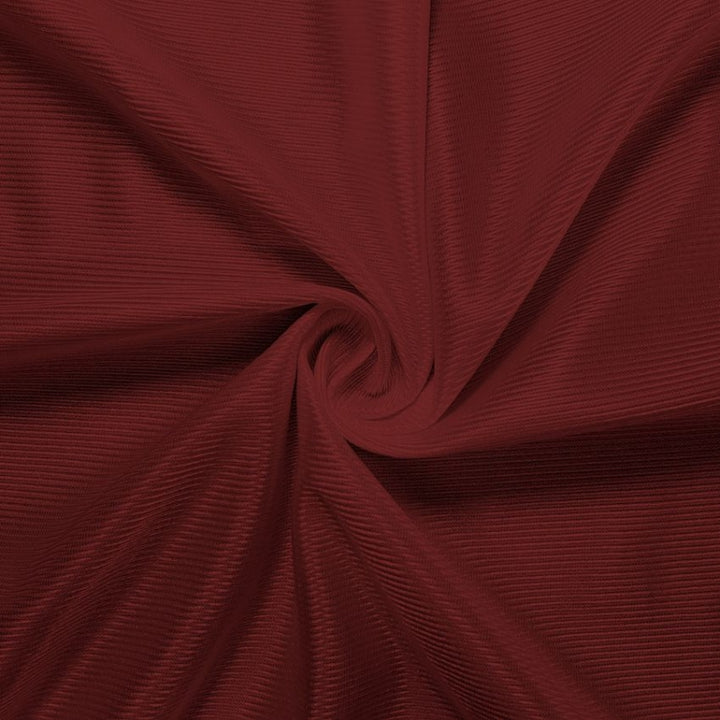 Athletic Dazzle Polyester fabric in Burgundy, sold by the yard