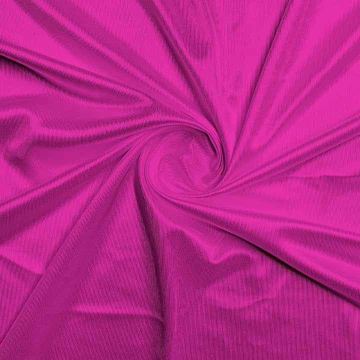Athletic Dazzle Polyester fabric in Fuchsia, sold by the yard