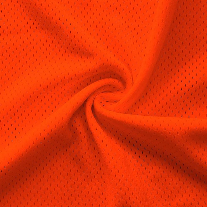 Athletic Pro Mesh Jersey fabric in Neon Orange, sold by the yard