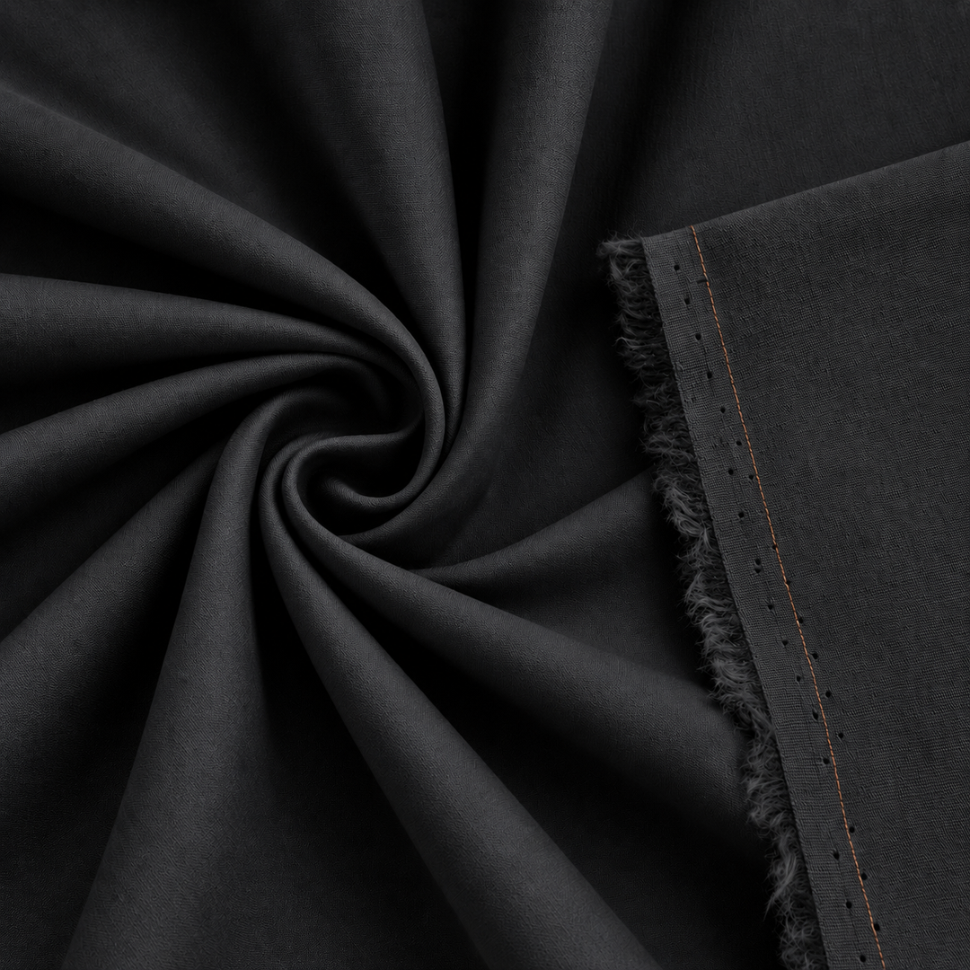 Cotton stretch poplin fabric in black color, showcasing smooth, soft texture, and suitable for various sewing projects.