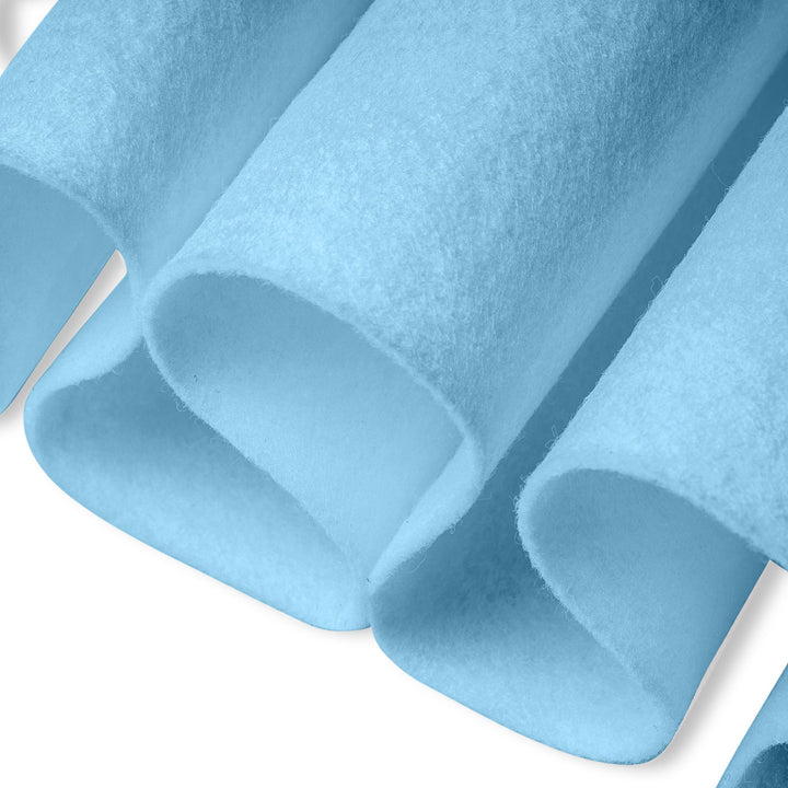 Close-up of blue felt fabric on a white background