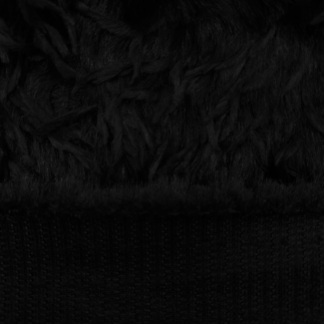 Black feather mink faux fur fabric with long silky pile shown flat for sewing and craft projects