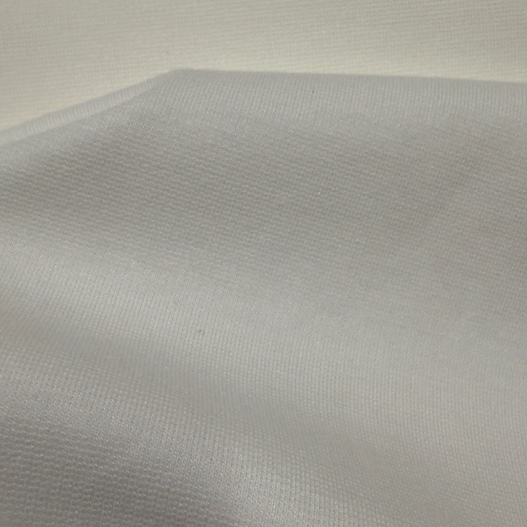 Close-up of textured White interlock fabric
