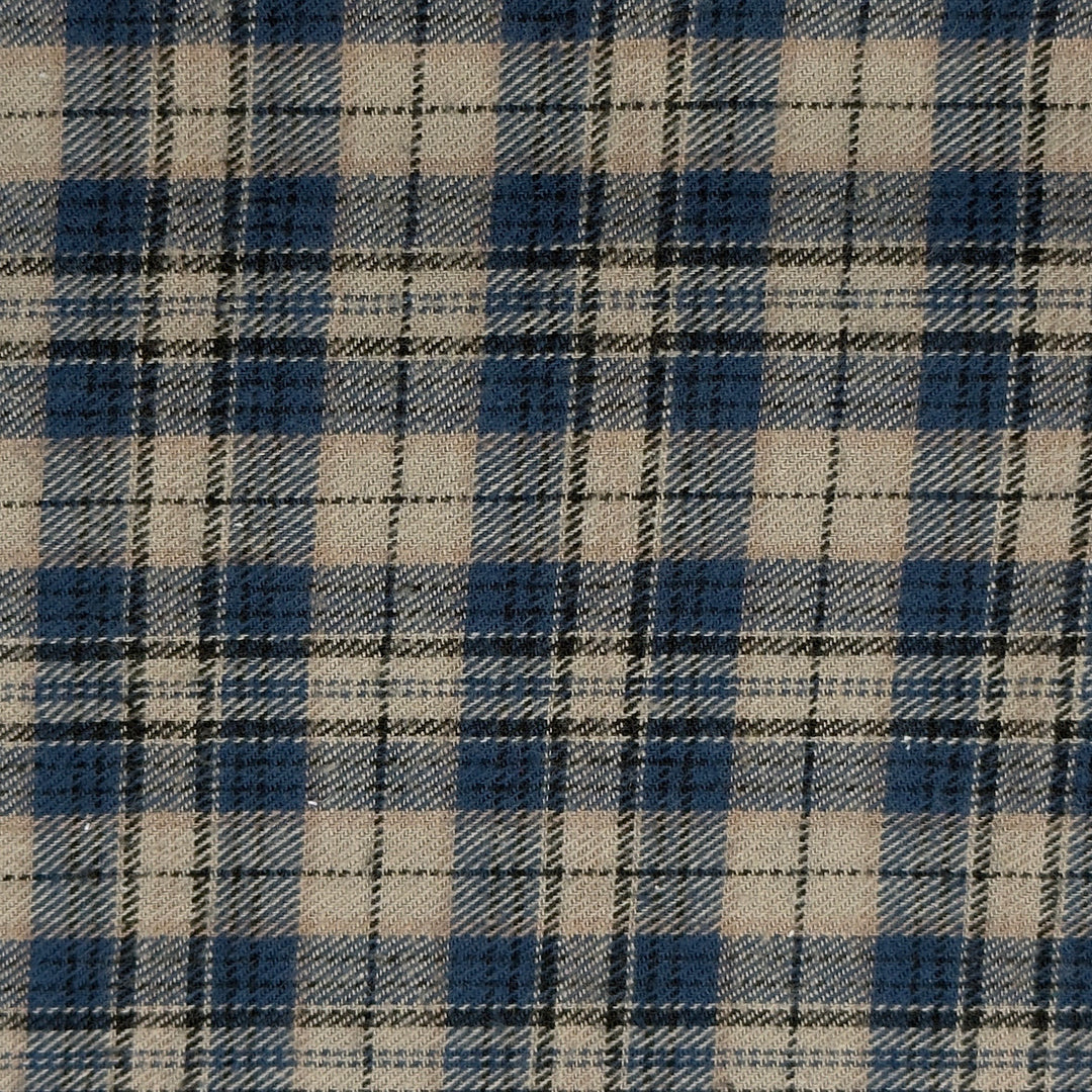 Close-up of a blue and beige plaid fabric pattern