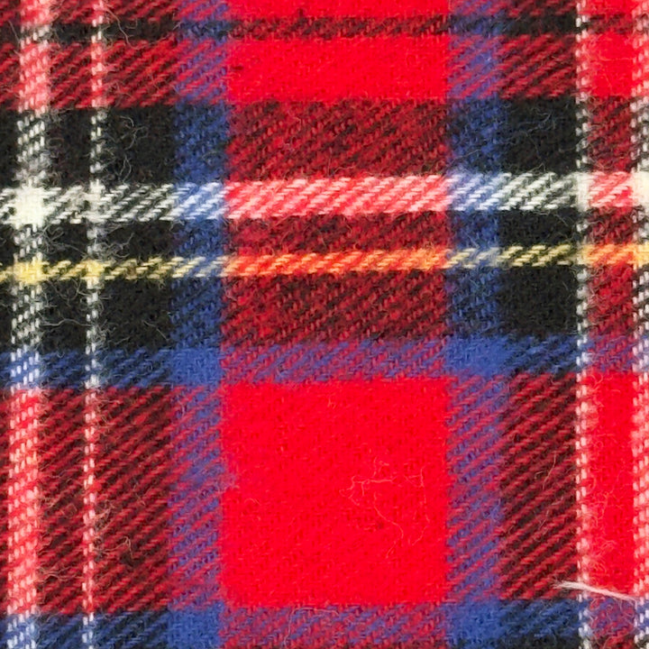 Close-up of a red, blue, and black plaid fabric pattern