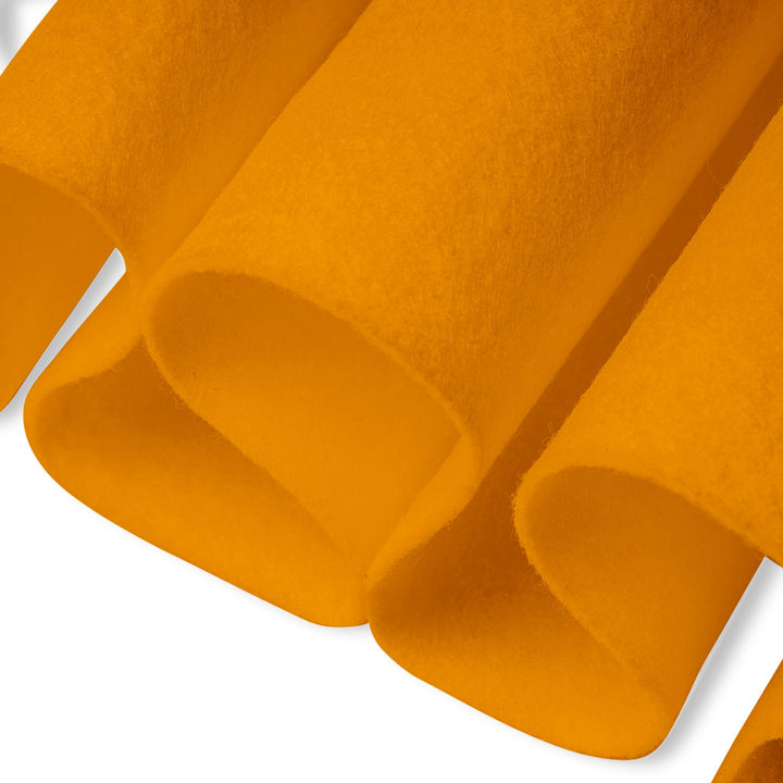 Close-up of orange felt fabric on a white background