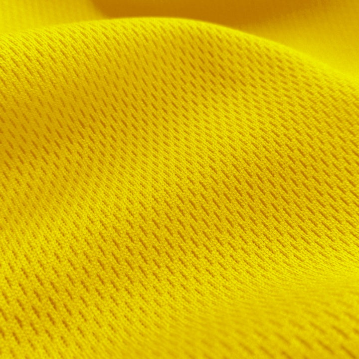 Dimple Mesh (Bird's Eye) fabric in Gold, sold by the yard