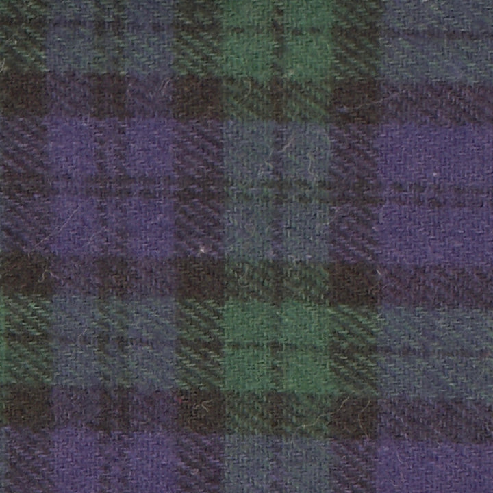 Close-up of a fabric with a plaid pattern in green and purple.