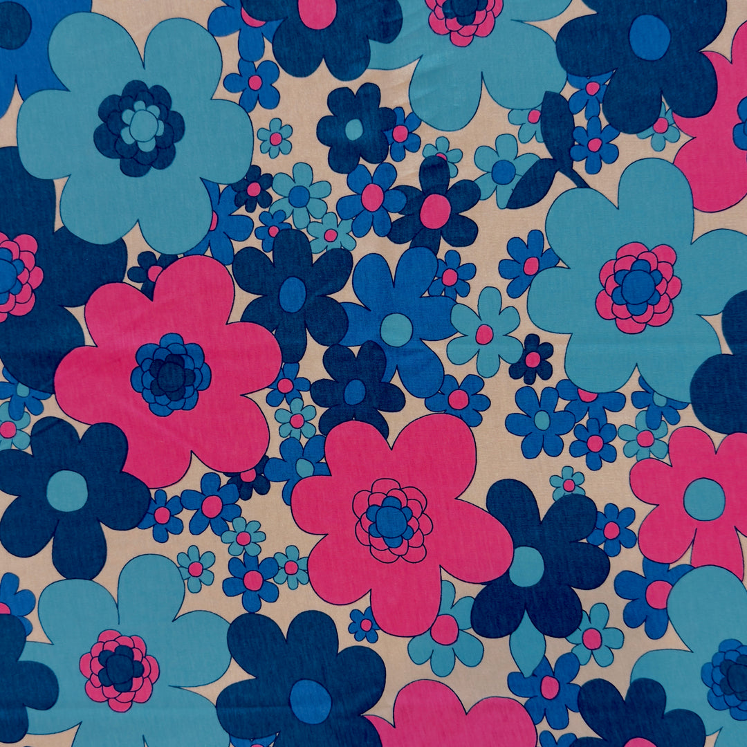 Pink and blue retro floral print cotton jersey knit fabric, 58–60 inch wide, 120 GSM.
