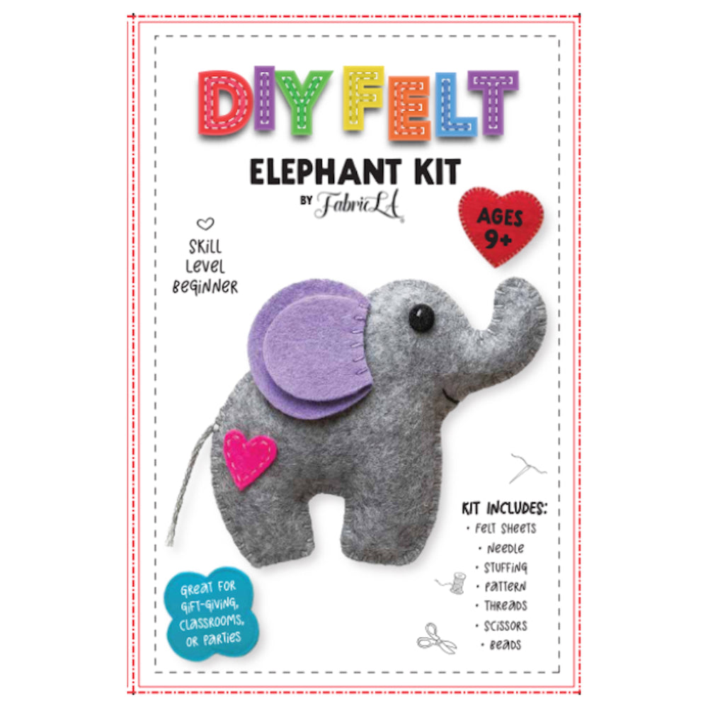 Packaging for a DIY Felt Elephant Kit by FabricLA, showing the completed felt elephant and the contents of the kit including felt fabric sheets, a needle, beads, scissors, and polyester stuffing.