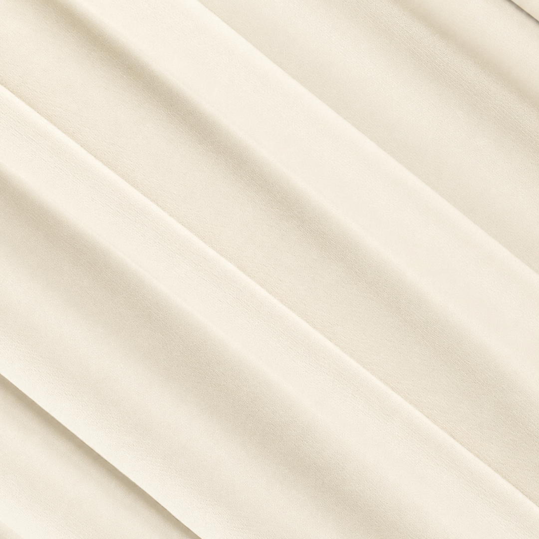 ITY Polyester Spandex Fabric in Ivory, featuring smooth and soft texture for comfortable use.
