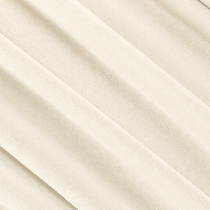 ITY Polyester Spandex Fabric in Ivory, featuring smooth and soft texture for comfortable use.