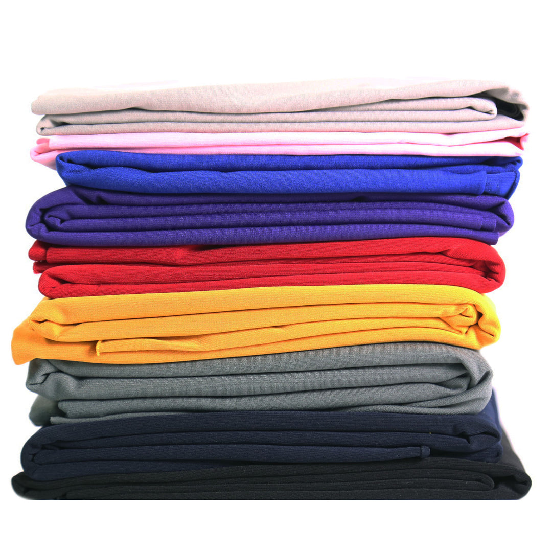ITY Polyester Spandex fabric stacks in various colors including ivory, showcasing stretchy and soft materials.