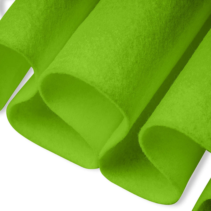 Close-up of green felt sheets on a white background
