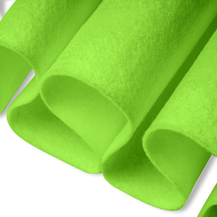 Close-up of green felt sheets on a white background