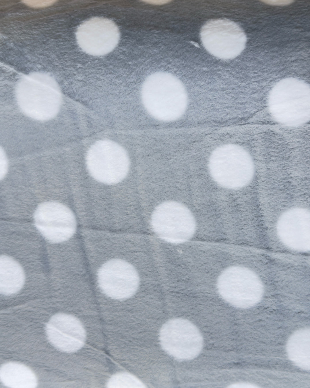 Gray fabric with white polka dots