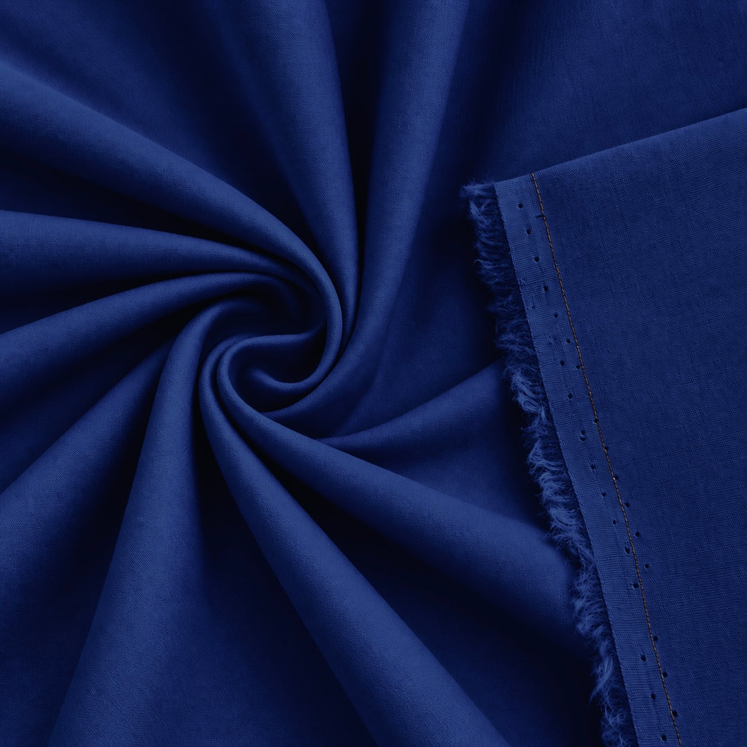 Cotton stretch poplin fabric in royal blue color, showcasing a smooth and breathable woven texture for versatile use.