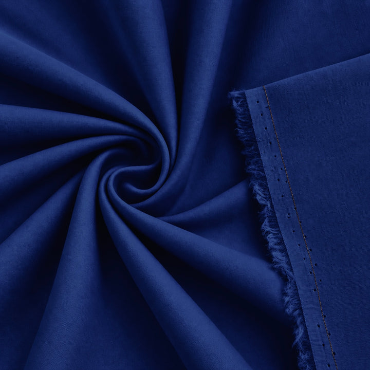 Cotton stretch poplin fabric in royal blue color, showcasing a smooth and breathable woven texture for versatile use.