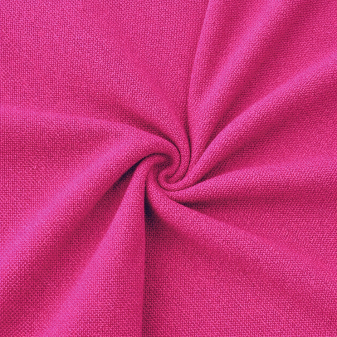 Close-up of vibrant pink rayon challis fabric by the yard, showcasing its soft and lightweight texture.