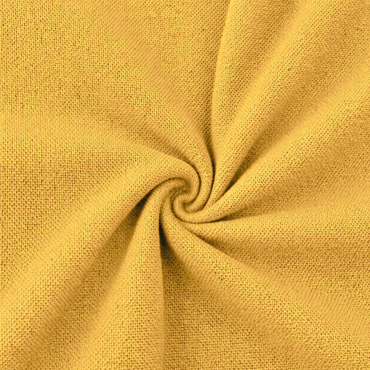 Rayon challis fabric by the yard in a soft yellow color, showcasing its lightweight and drapey texture.