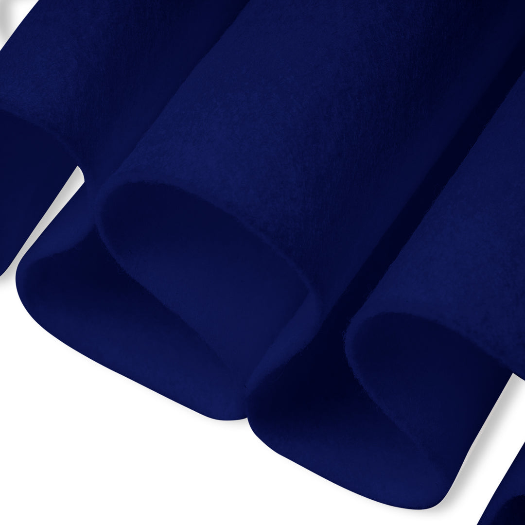 Close-up of blue felt fabric with a white background