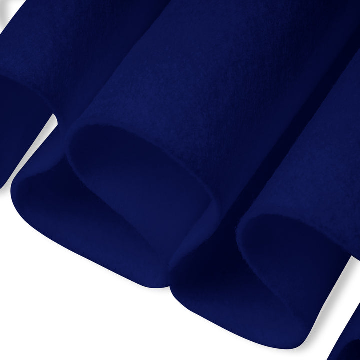 Close-up of blue felt fabric with a white background