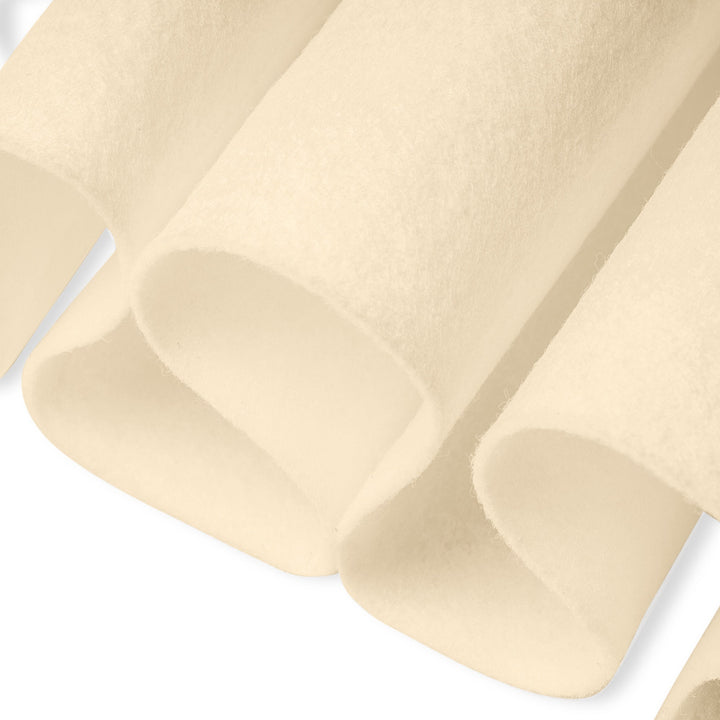 Close-up of sand felt fabric with a subtle pattern on a white background