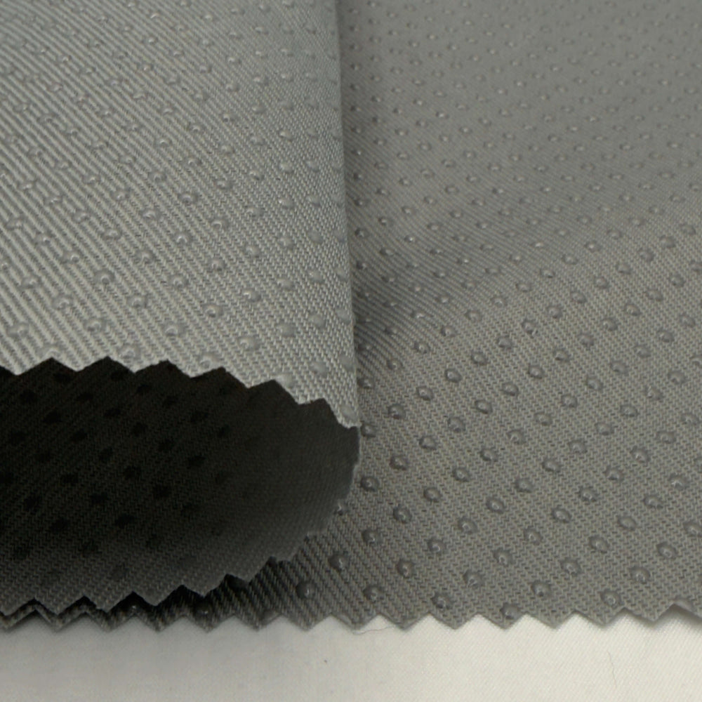 Silicone dot anti-slip fabric in gray, non slip fabric ideal for upholstery projects and stability.