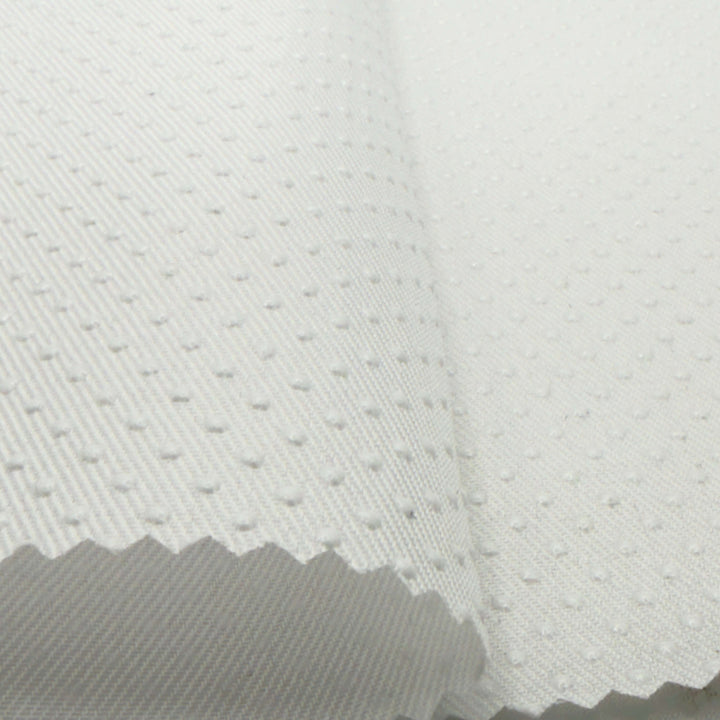Silicone dot anti-slip fabric in white, non slip fabric with textured grip for stability in sewing and upholstery projects.