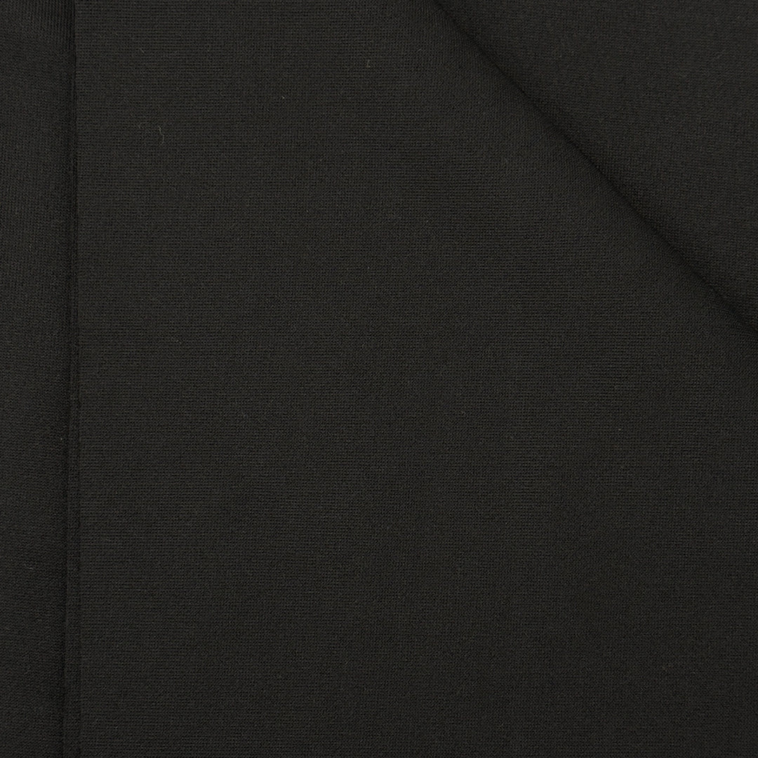 Techno scuba fabric draped over hand, showing body and fall
