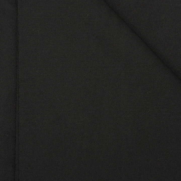 Techno scuba fabric draped over hand, showing body and fall