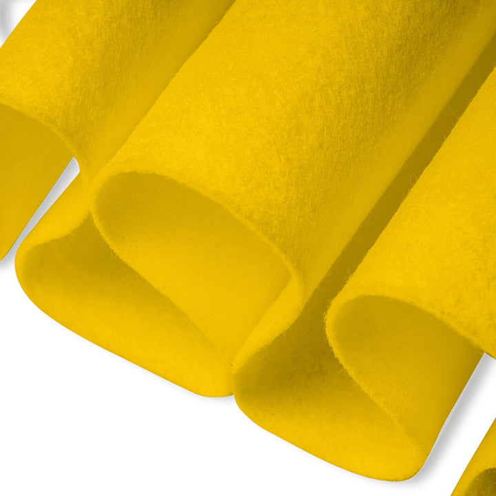 Close-up of yellow felt fabric on a white background