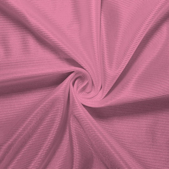 Athletic Dazzle Polyester fabric in Pink, sold by the yard