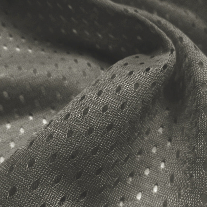 Football Mesh fabric in Dark Charcoal, 100% polyester, sold by the yard