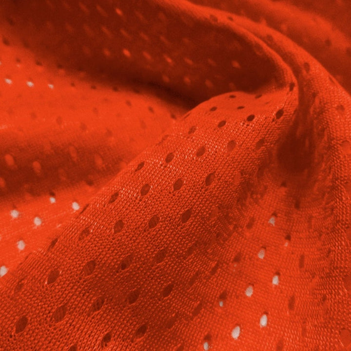 Football Mesh fabric in Orange, 100% polyester, sold by the yard