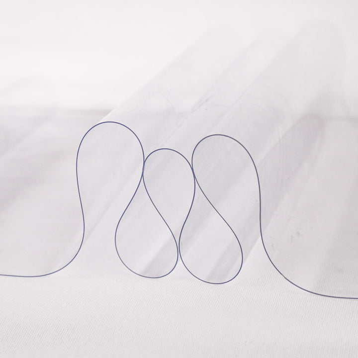 16 gauge clear vinyl fabric draped to show medium-weight transparency | FabricLA