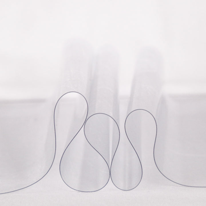 20 gauge clear vinyl fabric draped to show heavy-duty transparency | FabricLA